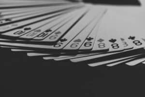 grayscale photo of a fanned playing card